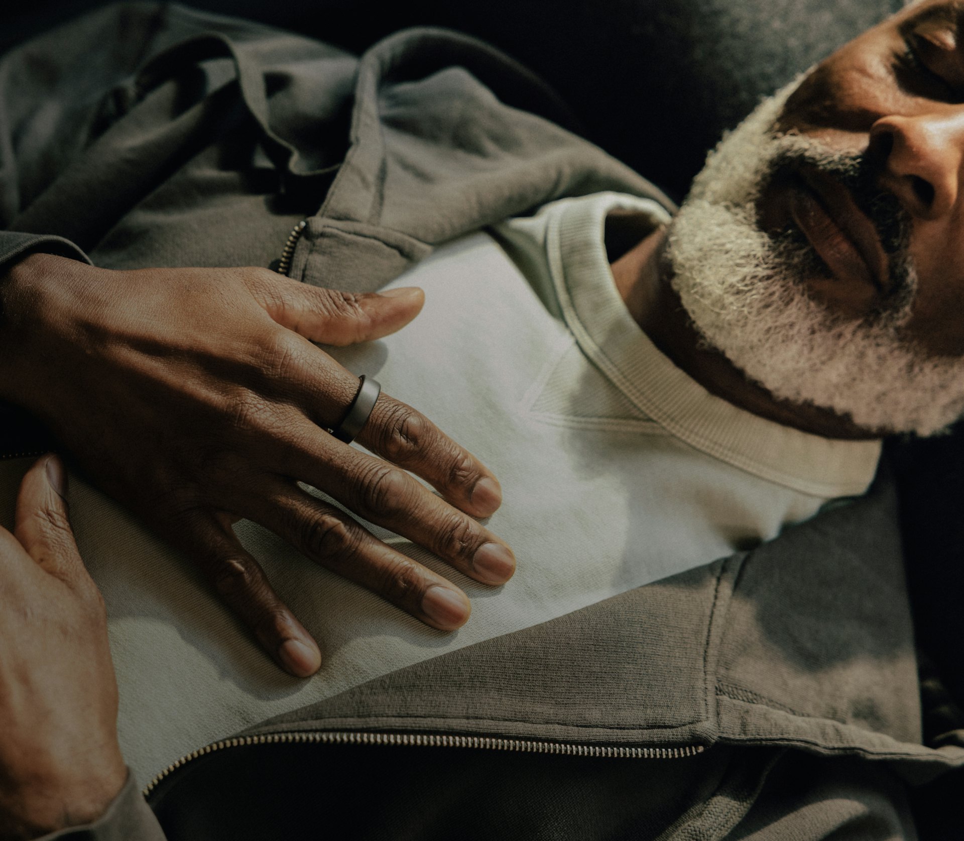 Man sleeping while wearing Oura Ring