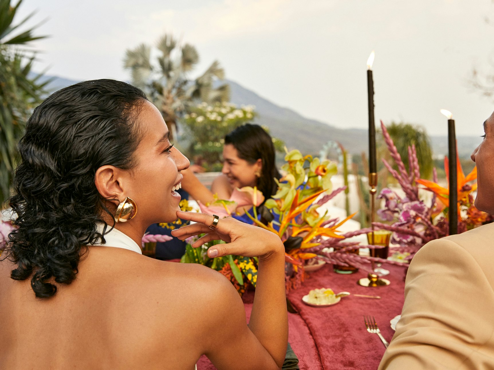 People engaged in conversation at a party